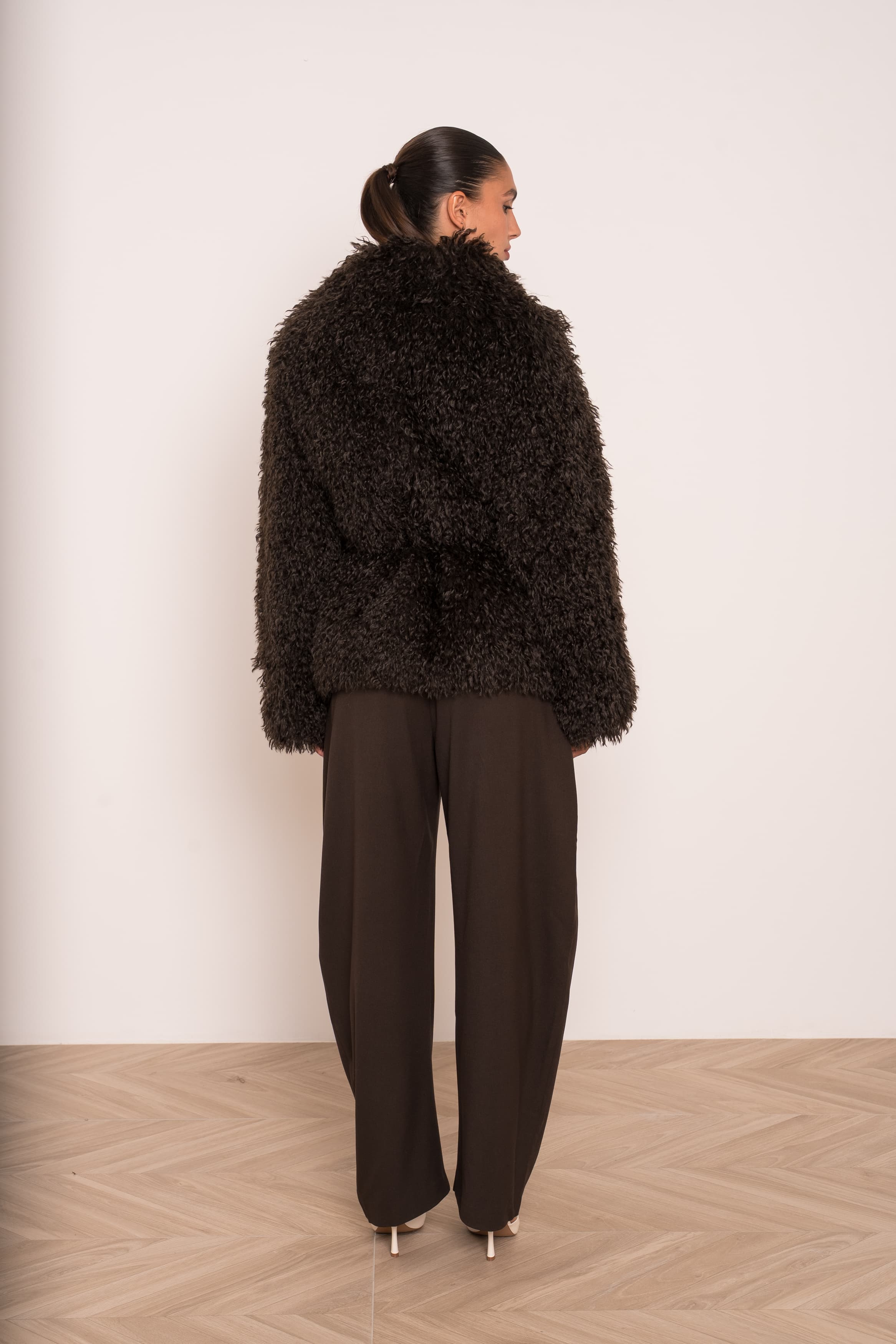 Veste réversible effet cuir et fourrure
