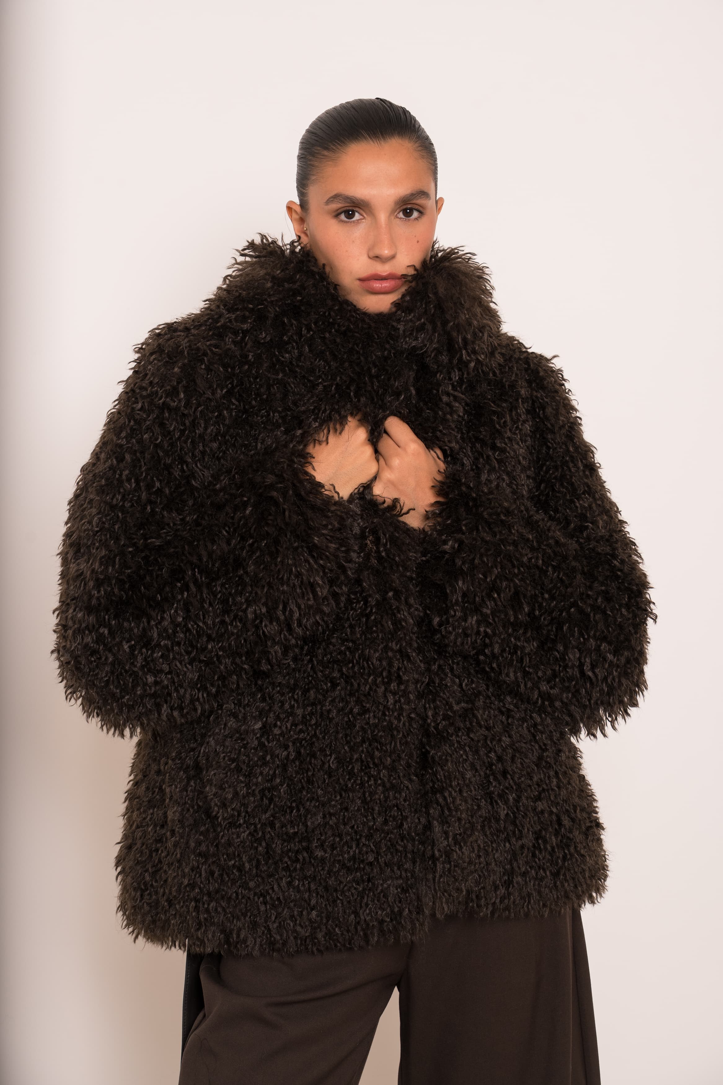 Veste réversible effet cuir et fourrure